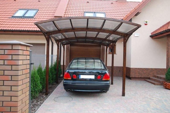 car shed in front of house